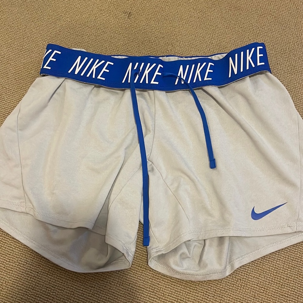 Nike shorts blue waste band. loose fitting size small